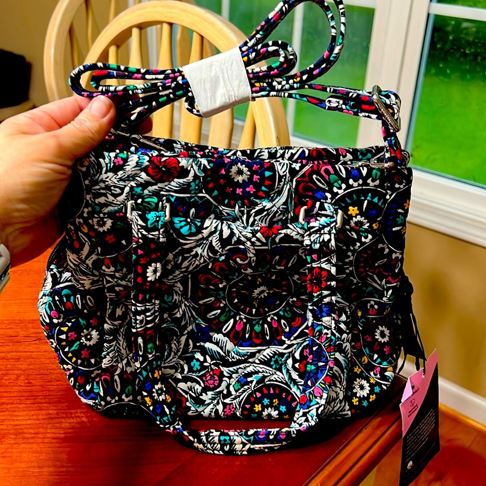 Vera Bradley small handbag.  Can be crossbody or has handles.  Never used.